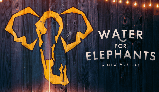 A spray-painted elephant on a wooden fence. Next to it, the words Water for Elephants, A New Musical