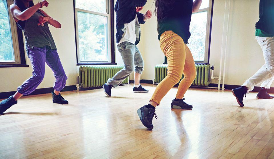Group of people dancing in a studio